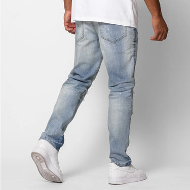 Balancia Distressed Tapered Jeans